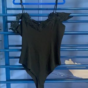 Black off the shoulders bodysuit